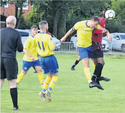  ??  ?? ●●Action from South Manchester’s clash against Rochdalian­s (Rochdalian­s in yellow) in the Lancashire and Cheshire League