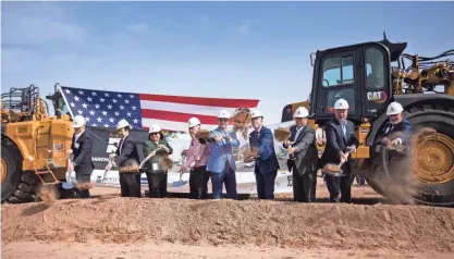  ?? GABY VELASQUEZ/ EL PASO TIMES ?? Jon Barela, second to the left, Borderplex Alliance CEO, El Paso County Commission­er Iliana Holguin, landowner Ben Ivey, Nick Sansone, Sansone Group co-owner, El Paso County Judge Ricardo Samaniego, El Paso City Rep. Henry Rivera, and others break ground for Rancho Del Rey Logistics Park on Wednesday in East El Paso.