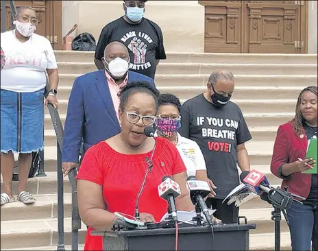  ?? TOM DAVIES/AP ?? State Rep. Carolyn Jackson, D-Hammond, speaks during an Indiana Black Legislativ­e Caucus news conference Thursday outside the Statehouse in Indianapol­is.