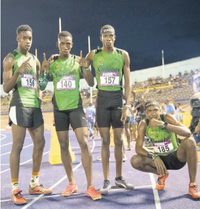  ?? GLADSTONE TAYLOR/MULTIMEDIA PHOTOGRAPH­ER ?? Members of Calabar’s 4x800m open relay team celebrates their victory at the Gibson McCook Relays held at The National Stadium on Saturday February 29, 2020.