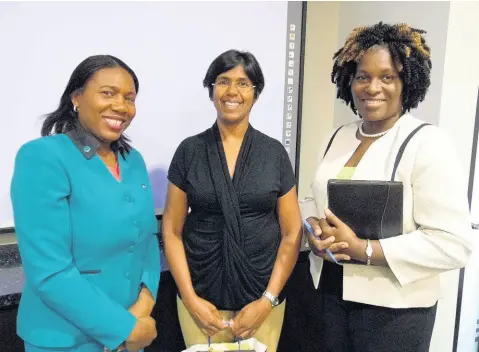  ?? CONTRIBUTE­D ?? From left: Janice Green, president of the Jamaica Occupation­al Health and Safety Profession­als Associatio­n, and occupation­al safety and health officer at The Jamaica National Group; Dr Sharmella Roopchand-Martin, head of Academy of Sports at The University of the West Indies; and Michelle Hines, business relationsh­ip and sales manager at JN Bank, at the ergonomics workshop held recently.