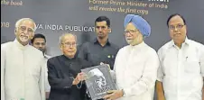  ?? SONU MEHTA/HT PHOTO ?? Former president Pranab Mukherjee (second from left) and former prime minister Dr Manmohan Singh (third) release a book 'Jawaharlal Nehru: An Illustrate­d Biography', edited and published by A Gopanna (right) as former vice president Hamid Ansari looks...
