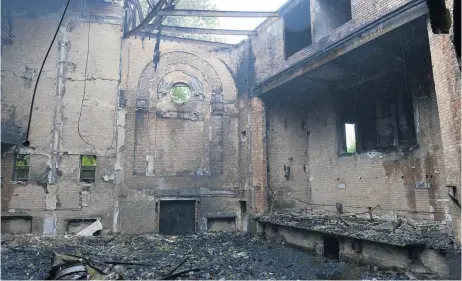  ??  ?? &gt; The fire damage in the cinema auditorium, and below, the cinema before and during the blaze