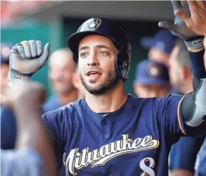  ??  ?? Playing in 71 of the Brewers' first 98 games, Ryan Braun has batted uncharacte­ristically low .235 with 10 home runs and 35 RBI.