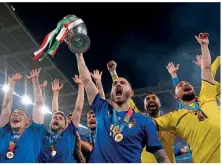  ?? ?? Champions…Azzurri centre-back Leonardo Bonucci raises aloft the Euro 2020 trophy