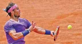  ?? (AFP/Reuters) ?? Spain’s Rafael Nadal returns the ball to Germany’s Alexander Zverev (not pictured) during their Italian Open quarter-final in Rome, Italy, yesterday. Nadal will play Reilly Opelka (below) next.