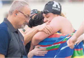  ?? MARLA BROSE/JOURNAL ?? Albuquerqu­e Academy’s Sara Vianco celebrates after winning the state championsh­ip and setting a new state record in the 200-yard freestyle Saturday at Academy.