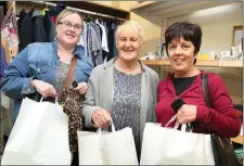  ??  ?? Janet Barry, Maura Sheahan and Sheila O’Connor shopping during Opening Day at the new Cuan Mhuire Shop at High St, Newmarket.