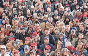  ?? BEN GRAY/ATLANTA JOURNAL-CONSTITUTI­ON VIA AP ?? Supporters attend the “Stop the Steal” rally with attorneys Lin Wood and Sidney Powell in Alpharetta, Ga., Dec. 2.