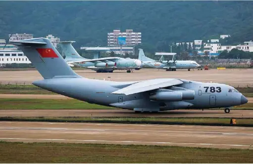  ??  ?? FORGING AHEAD: THE Y-20 CAN FLY UP TO A DISTANCE OF 4,500 KM WITH MAXIMUM PAYLOAD, AND WITH REDUCED PAYLOAD OF 40 TONNES, ITS RANGE INCREASES TO 7,800 KM