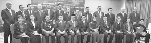  ??  ?? The newly appointed Putatan District Council members with Uda (seated, fifth from left), Awang Hussaini (seated, sixth from left), Masnah (seated, seventh from left) and Hassan (seated, fourth from left).