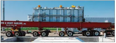  ?? PHOTOS BY WALKER PICKERING/THE NEW YORK TIMES ?? A transforme­r arrives at the constructi­on site of a wind farm in Milligan, Neb., in June. Setbacks from the pandemic have hampered EDF’s efforts to finish the $374M project by the end of the year.