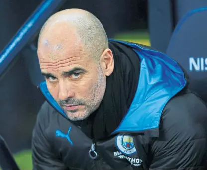  ?? Picture: Shuttersto­ck. ?? Manchester City manager Pep Guardiola is preparing for Real Madrid.