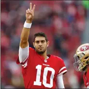  ?? NHAT V. MEYER/TRIBUNE NEWS SERVICE ?? San Francisco 49ers starting quarterbac­k Jimmy Garoppolo (10) waves to the crowd before Sunday's game against the Jaguars in Santa Clara.