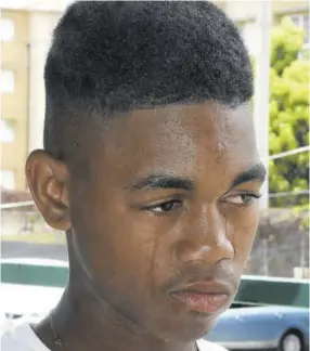  ??  ?? 16-year-old Demitri Brown recalling the pain of losing his father in the 2010 Tivoli incursion.