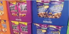  ?? —AP ?? NEW YORK: In this Saturday, May 20, 2017, photo, boxes of the Aldi food market chain’s Millville Raisin Bran are on display in a purple box similar to the versions made by Kellogg and Post, at an Aldi store.