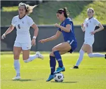  ?? LARRY NOVEY/COURTESY ORLANDO PRIDE ?? Orlando Pride star striker Alex Morgan turns on the ball in a preseason scrimmage against Florida State.