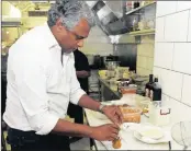  ??  ?? Seelan Sundoo owns two restaurant­s in Cape Town.