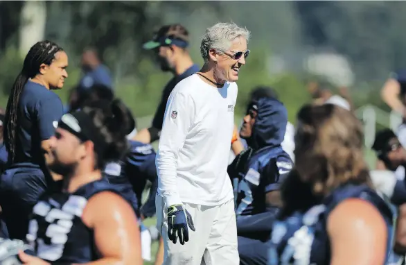  ?? TED S. WARREN/THE ASSOCIATED PRESS ?? Seahawks head coach Pete Carroll, who was all smiles during training camp on Thursday in Renton, Wash., may have the most to prove this season