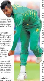  ?? REUTERS ?? Mohammad Amir pulled up injured against India.