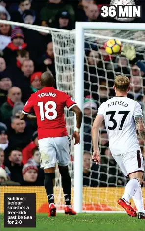  ??  ?? Sublime: Defour smashes a free-kick past De Gea for 2-0