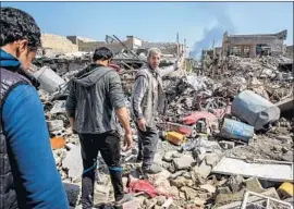  ?? Marcus Yam Los Angeles Times ?? AN AIRSTRIKE in Mosul’s Jadidah area killed more than 100 Iraqis in March, in one of the deadliest civilian casualty incidents in modern U.S. military history.