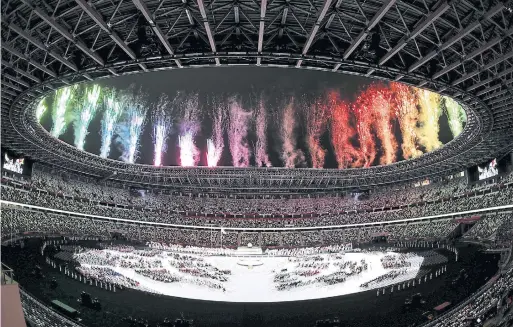  ?? NAOMI BAKER GETTY IMAGES ?? Fireworks explode during the opening ceremony of the Tokyo Paralympic­s at National Stadium in Tokyo on Tuesday.