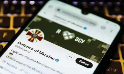  ?? Today. Photograph: Beata Zawrzel/NurPhoto/REX/Shuttersto­ck ?? Ukraine’s defence ministry’s Twitter account displayed on a mobile phone. Russian government websites including the Kremlin and the Duma have been targeted by DDoS attacks as well as Russia