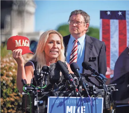  ?? JOSH MORGAN/USA TODAY ?? Reps. Marjorie Taylor Greene, R-GA., and Thomas Massie, R-KY., hold a news conference outside the U.S. Capitol on May 1 about a potential motion to vacate against House Speaker Mike Johnson.