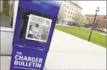  ?? Arnold Gold / Hearst Connecticu­t Media ?? A Charger Bulletin honor box retains the Feb. 17 issue at a deserted University of New Haven campus in West Haven on Monday.
