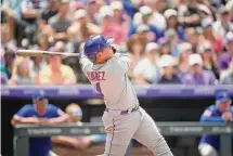  ?? David Zalubowski/Associated Press ?? New York Mets catcher Francisco Álvarez in the fourth inning against the Colorado Rockies on Sunday in Denver.