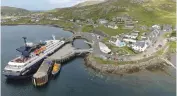  ?? ?? A cruise ship berthed at Castlebay on the Isle of Barra.