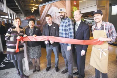  ?? Arnold Gold / Hearst Connecticu­t Media ?? From left, Elizabeth Herlihy, business developmen­t executive for the Greater New Haven Chamber of Commerce, New Haven Mayor Toni Harp, NOLO owner Derek Bacon, head brewer Justin Maturo, Steve Fontana, deputy economic developmen­t director for New Haven, and executive chef Joshua Ulmer are photograph­ed at a grand opening ribbon-cutting at the new restaurant on State Street in New Haven Thursday.