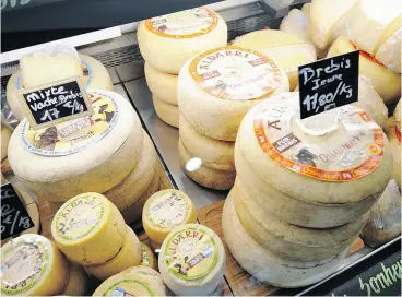  ?? GAIZKA IROZ / AFP / GETTY IMAGES FILES ?? The latest proposals in Health Canada’s new Canada Food Guide recommends eating lower fat cheeses than the full fat ones, Rosie Schwartz writes.