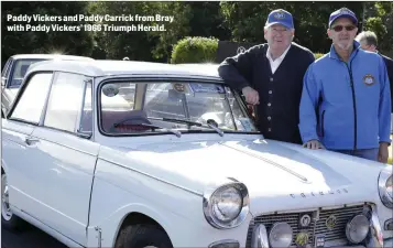  ??  ?? Paddy Vickers and Paddy Carrick from Bray with Paddy Vickers’ 1966 Triumph Herald.