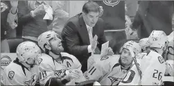  ?? Mark Humphrey / The Associated Press ?? Nashville coach Peter Laviolette talks to his players during Game 4 on Thursday.