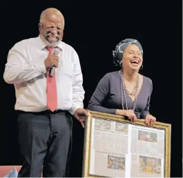  ?? PICTURE: JEFFREY ABRAHAMS ?? Dr John Kani receives a gift from Marlene le Roux, CEO of the Artscape Theatre, after the opening performanc­e of Missing. It marked the first time he had performed there.