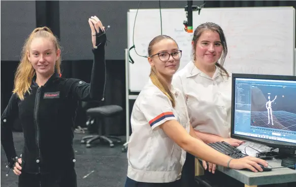  ?? Picture: TOM BOROWIK ?? Saint Stephen's College students Ailish Mahony, Macey Williams and Mia van Zyl are working with TAFE technology to capture animations.