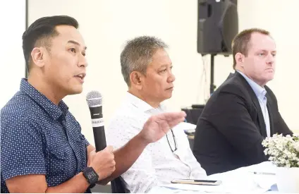  ?? SUNSTAR FOTO / ARNI ACLAO ?? COMPETING WITH AI. Cebu IT-BPM Organizati­on president Gregg Gabison (left) says efforts to sustain the growth of the industry will be tackled in next month’s Transforma­tion Summit. He is joined by CIB.O managing director Wilfredo Saa Jr. and SYKES Cebu...