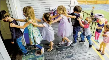  ?? EDUARDO CONTRERAS U-T PHOTOS ?? Owner Celine Theano (top) comforts student Audrey Phipps, 3, at Le Petite Etoile 360. The University Heights preschool is one of over 32,000 day-care centers listed on the site of a local tech startup called Tootris.