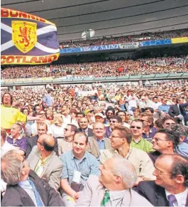  ??  ?? Scotland supporters at the opening game of the ‘98 World Cup against Brazil at Stade de France in Paris.