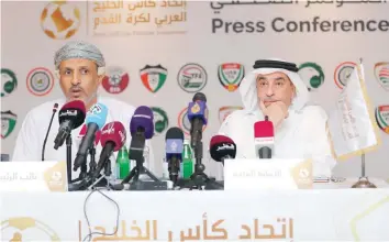  ?? — AFP ?? Oman’s Jassim al Shukaili (L), Vice-president of the Arab Gulf Cup Football Federation (AGCFF), and Jassim al Rumaihi, General Secretary of AGCFF, speak during a press conference in Doha.