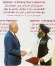  ?? Foto: dpa ?? US-Gesandter Khalilzad (links) besiegelt den Vertrag mit den Taliban.