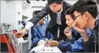  ?? PROVIDED TO CHINA DAILY ?? Residents visit an intelligen­t ambulance on show.
