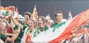  ?? JASON MALLOY/THE GUARDIAN ?? Logan MacDougall, right, carries the Island flag to lead Team P.E.I. into the opening ceremonies of the 2017 Canada Summer Games last night in Winnipeg.