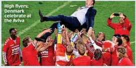  ??  ?? High flyers: Denmark celebrate at the Aviva