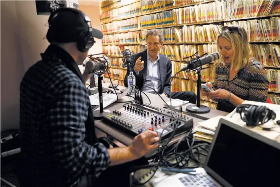  ?? Photos by Scott Strazzante / The Chronicle ?? Giants CEO Larry Baer (center) joins The Chronicle’s Peter Hartlaub and Heather Knight for a podcast about his 1980 ride of all the city’s Muni lines.