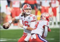  ?? Brian Blanco / Associated Press ?? Clemson quarterbac­k Trevor Lawrence looks for a receiver during the ACC championsh­ip game against Notre Dame on Dec. 19.