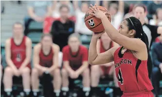  ?? MICHAEL BELL THE CANADIAN PRESS ?? St. Jean de Brebeuf grad Jenjen Abella of the Carleton Ravens takes a foul shot during the final in Regina.