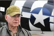  ?? MARSHALL GORBY / STAFF ?? Col. Malcolm “Mitch” Mitchell talks about the historic plane that landed at the National Museum of the Air Force on Tuesday for a three-day visit.